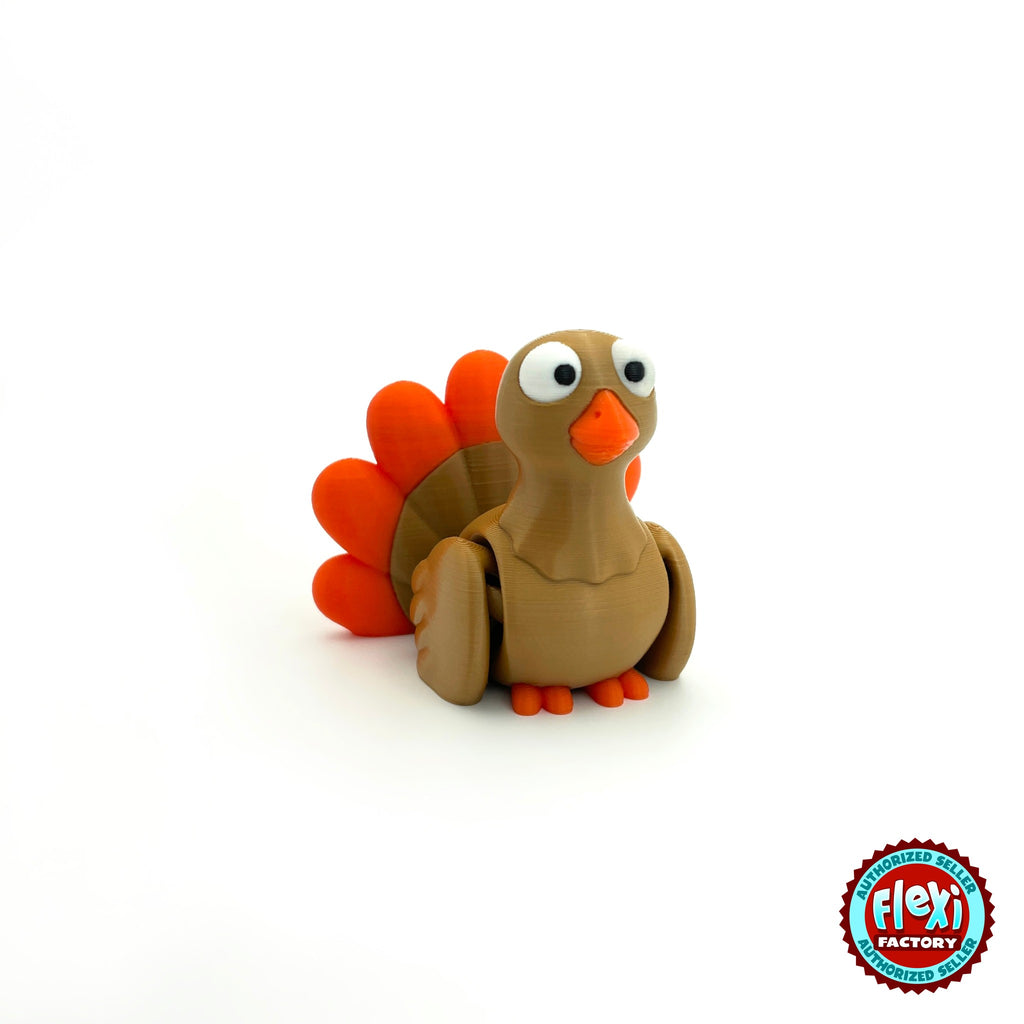 Cute turkey keychain, 3D printed by RU3D – three quarter view facing right. Brown with orange tail feathers.