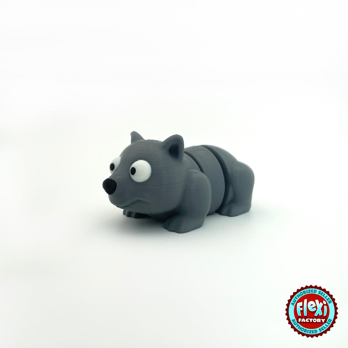 Cute wombat keychain, 3D printed by RU3D – three quarter view facing left. Charcoal grey.