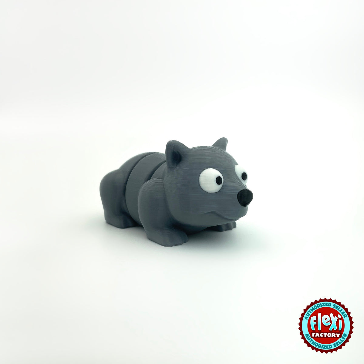 Cute wombat keychain, 3D printed by RU3D – three quarter view facing right. Charcoal grey.
