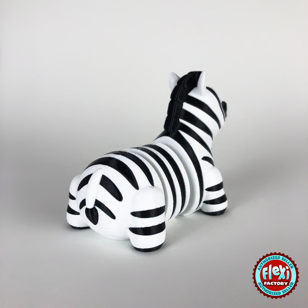 Cute zebra keychain, 3D printed by RU3D – rear three quarter view. Black and white stripes.