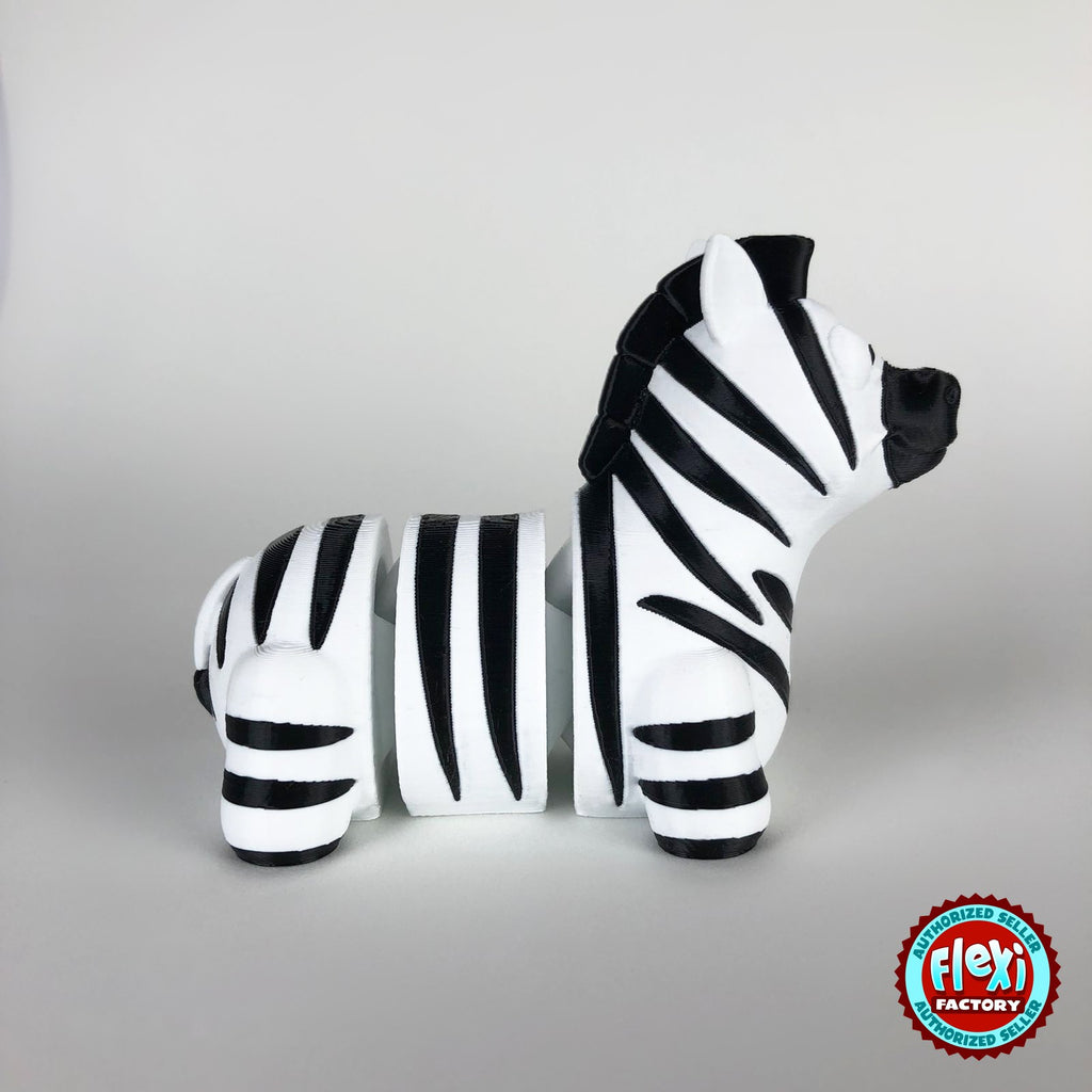 Cute zebra keychain, 3D printed by RU3D – side view facing right. Black and white stripes.