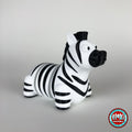 Cute zebra keychain, 3D printed by RU3D – three quarter view facing right. Black and white stripes.