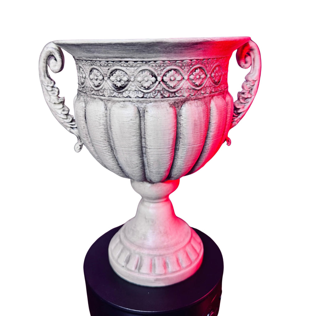 Greek urn trophy cup by RU3D on a display stand, weathered stone finish