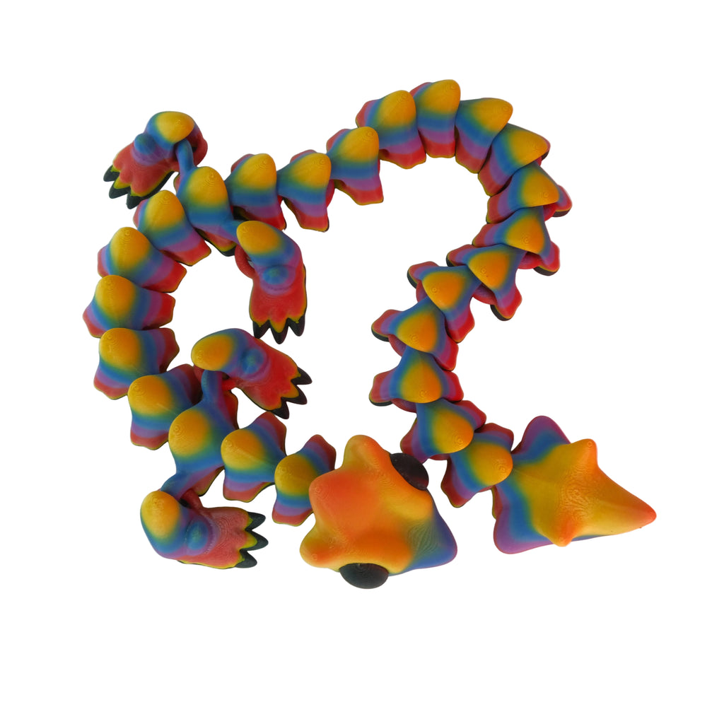 A colorful, interlocking flexible figure shaped like a snake with various segments featuring bright rainbow colors and a star-like end piece.