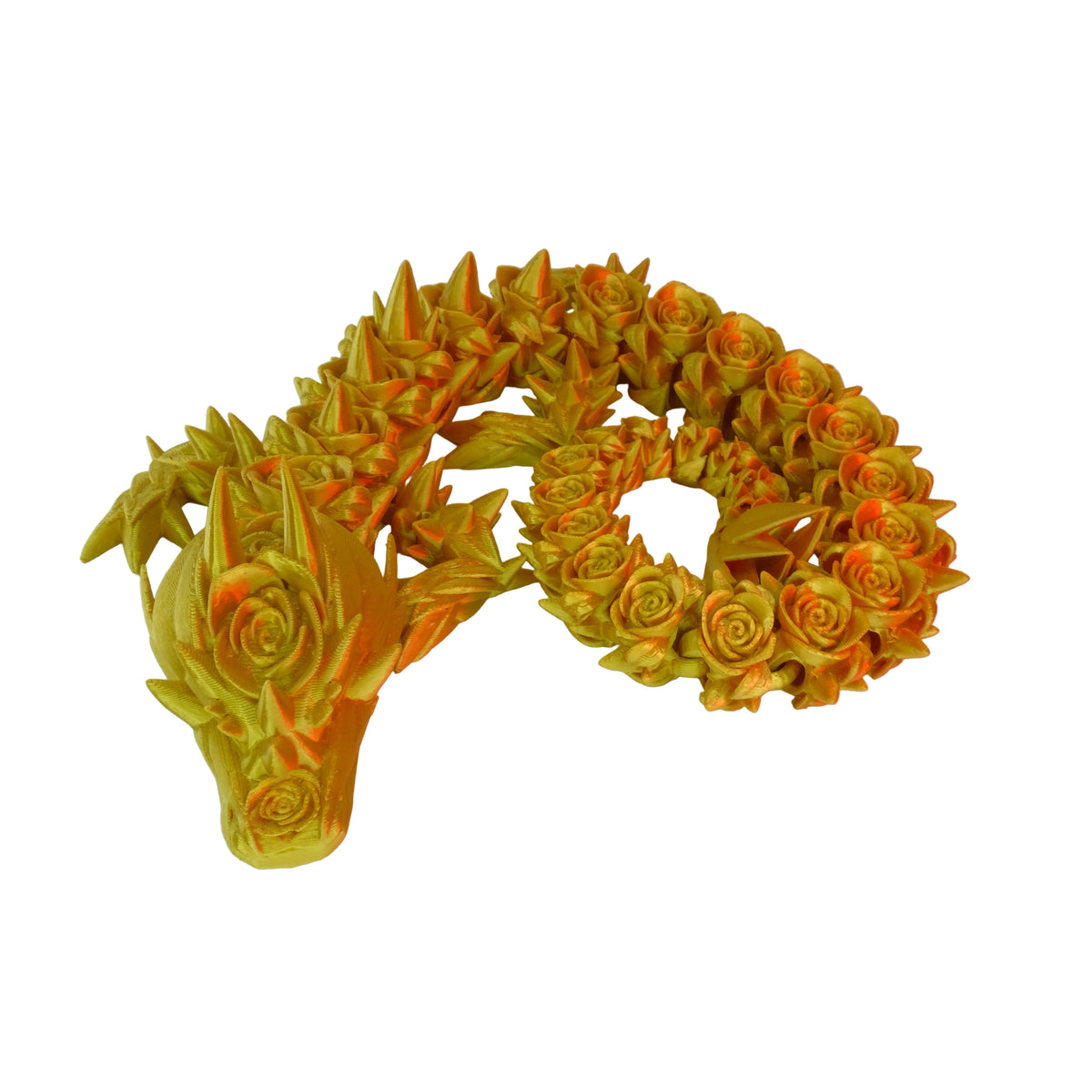 A textured dragon figurine in yellow with ornate rose designs along its body.
