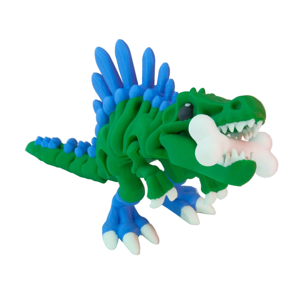 A green and blue articulated dinosaur flexi-figure with a spiky back and a white bone in its mouth, posed in a playful stance.