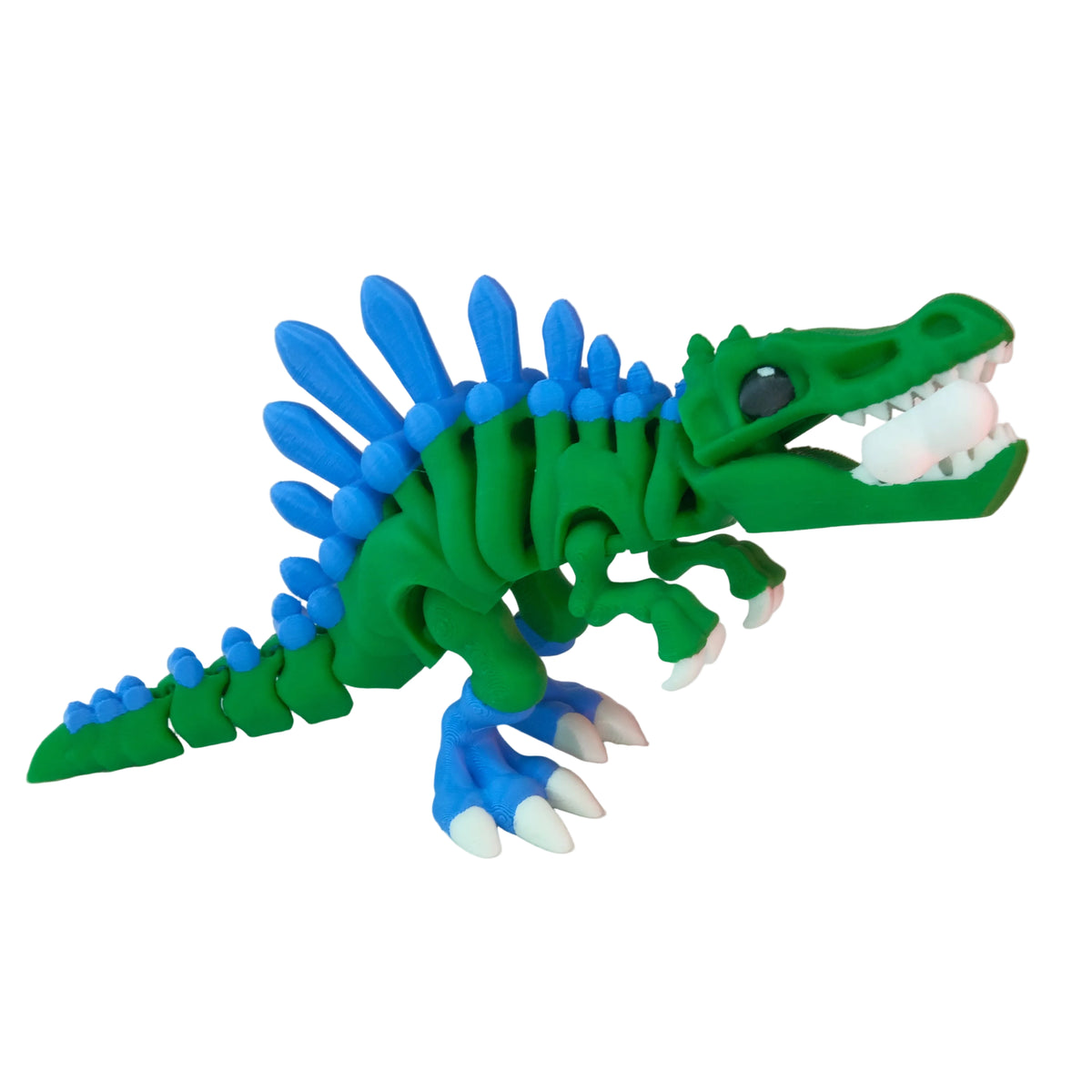 A green dinosaur figurine with blue spikes and white teeth, featuring articulated joints for movement.