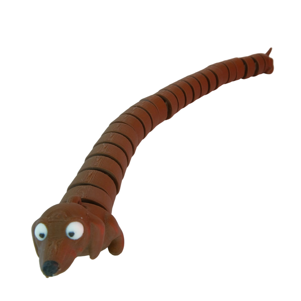 A flexible, articulated snake toy in red-brown color with a cartoonish head featuring bulging eyes.
