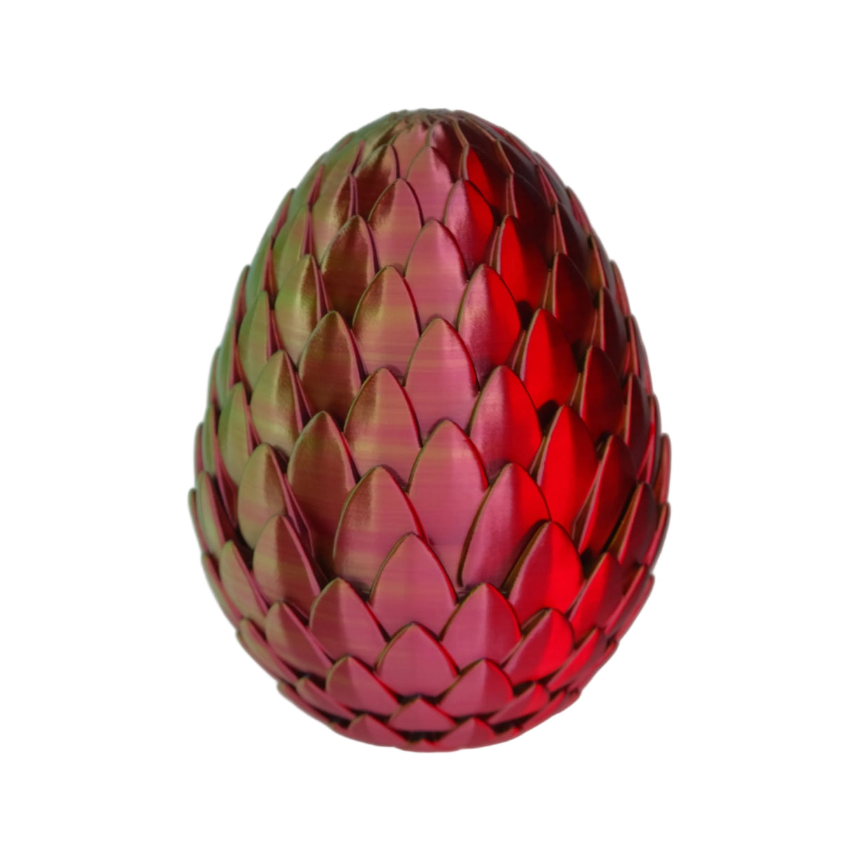 An ornate, glossy red egg-shaped ornament with a textured surface resembling scales or petals, resting on a white background.