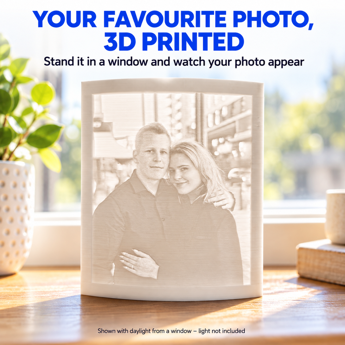 3D photo lithophane by RU3D featuring a couple's portrait, displayed on a wooden windowsill with natural daylight revealing the personalised 3D printed photo.