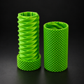 Spiral twist storage container with geometric rotating design on a dark charcoal studio background.